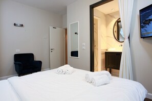 1 slaapkamer, een strijkplank/strijkijzer, wifi, beddengoed