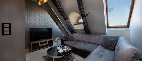 Apartamento premier, 1 quarto, vista para a cidade | 1 quarto, roupas de cama premium, cofres nos quartos