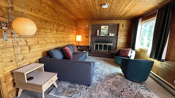 Smart TV, fireplace, DVD player, books