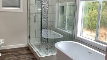 Bathtub, hair dryer, towels, soap