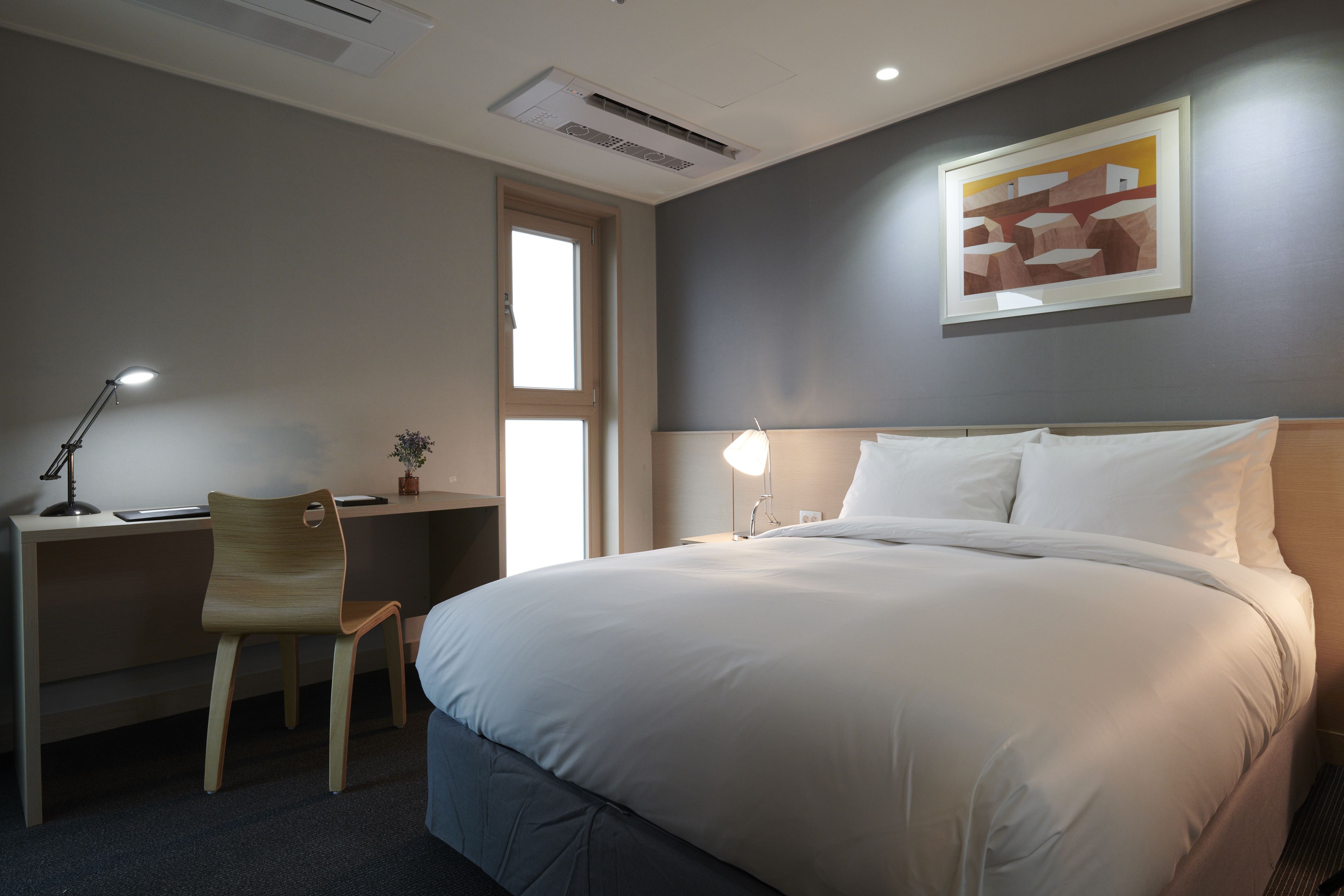 deluxe double room | premium bedding, down duvets, blackout curtains, iron/ironing board