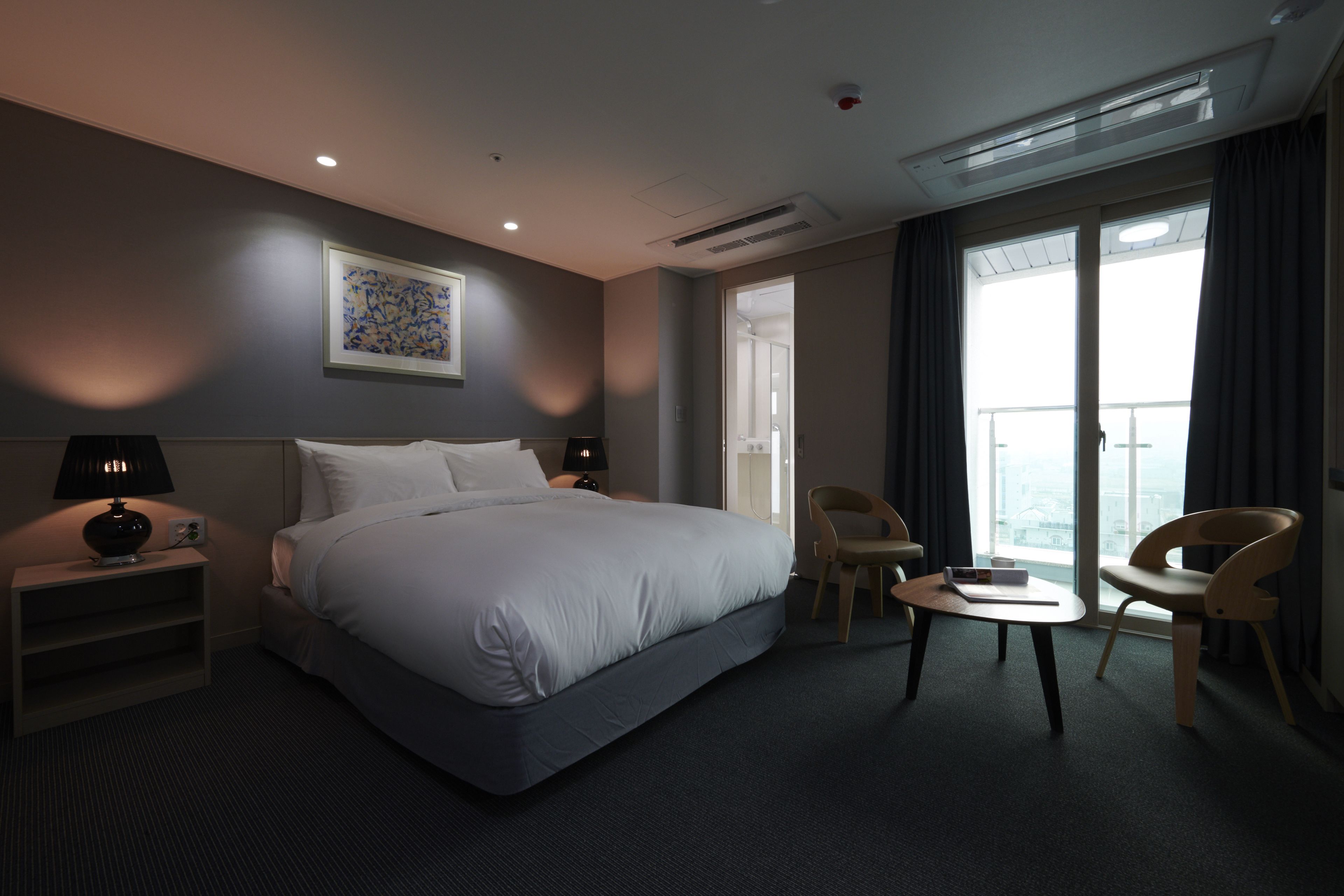 double room | premium bedding, down duvets, blackout curtains, iron/ironing board