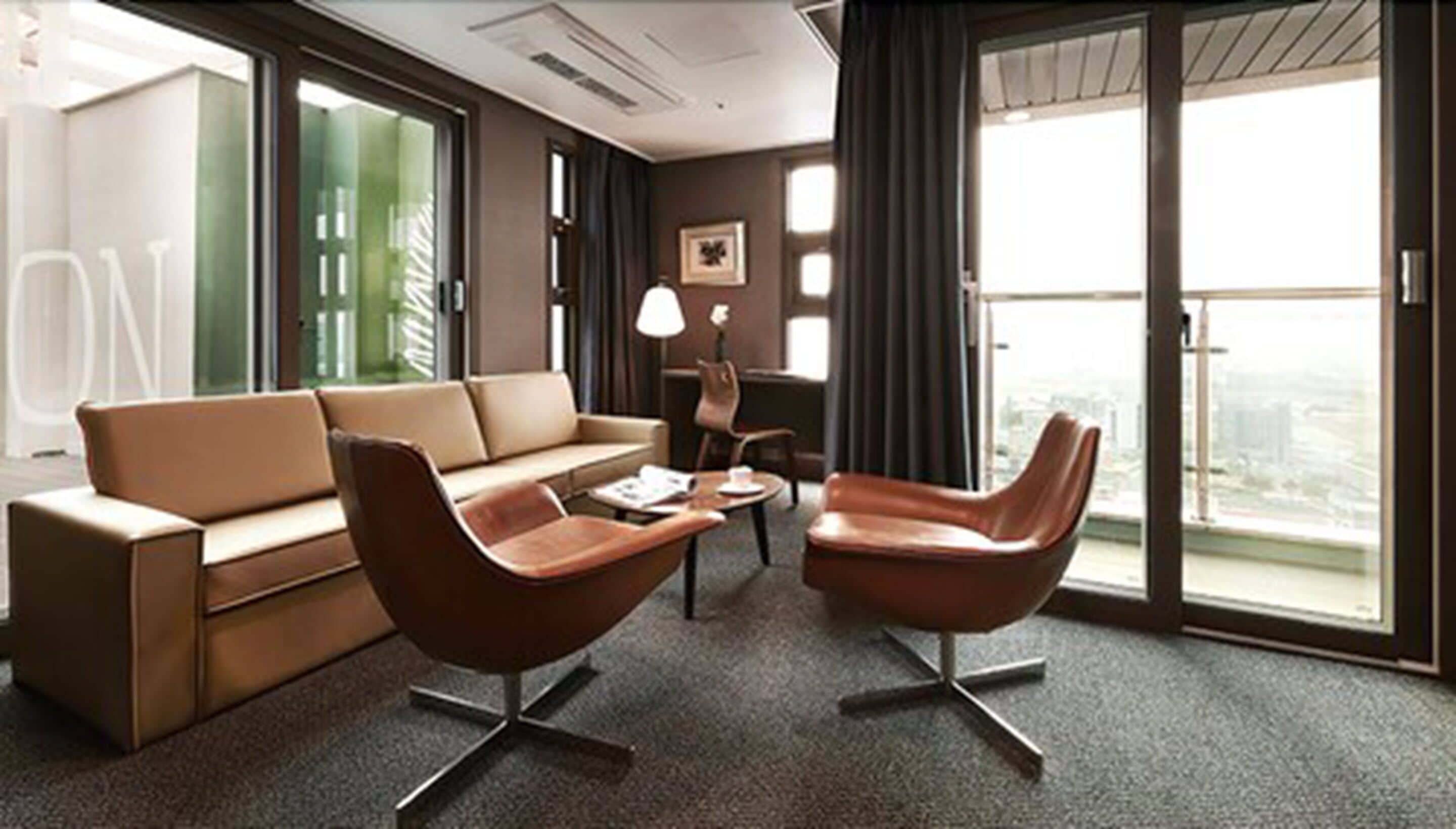 raon suite | premium bedding, down duvets, blackout curtains, iron/ironing board