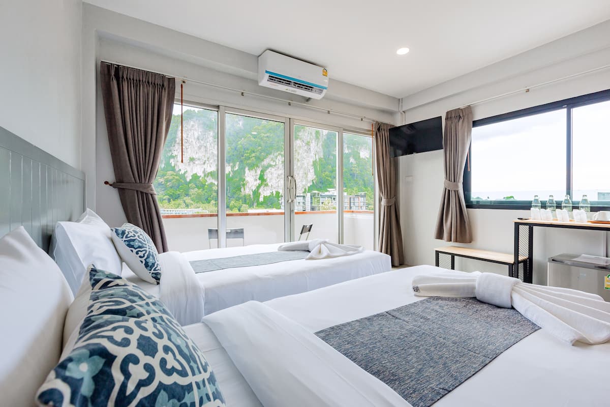 Deluxe Quadruple Room, Mountain View | Egyptian cotton sheets, premium bedding, in-room safe, desk