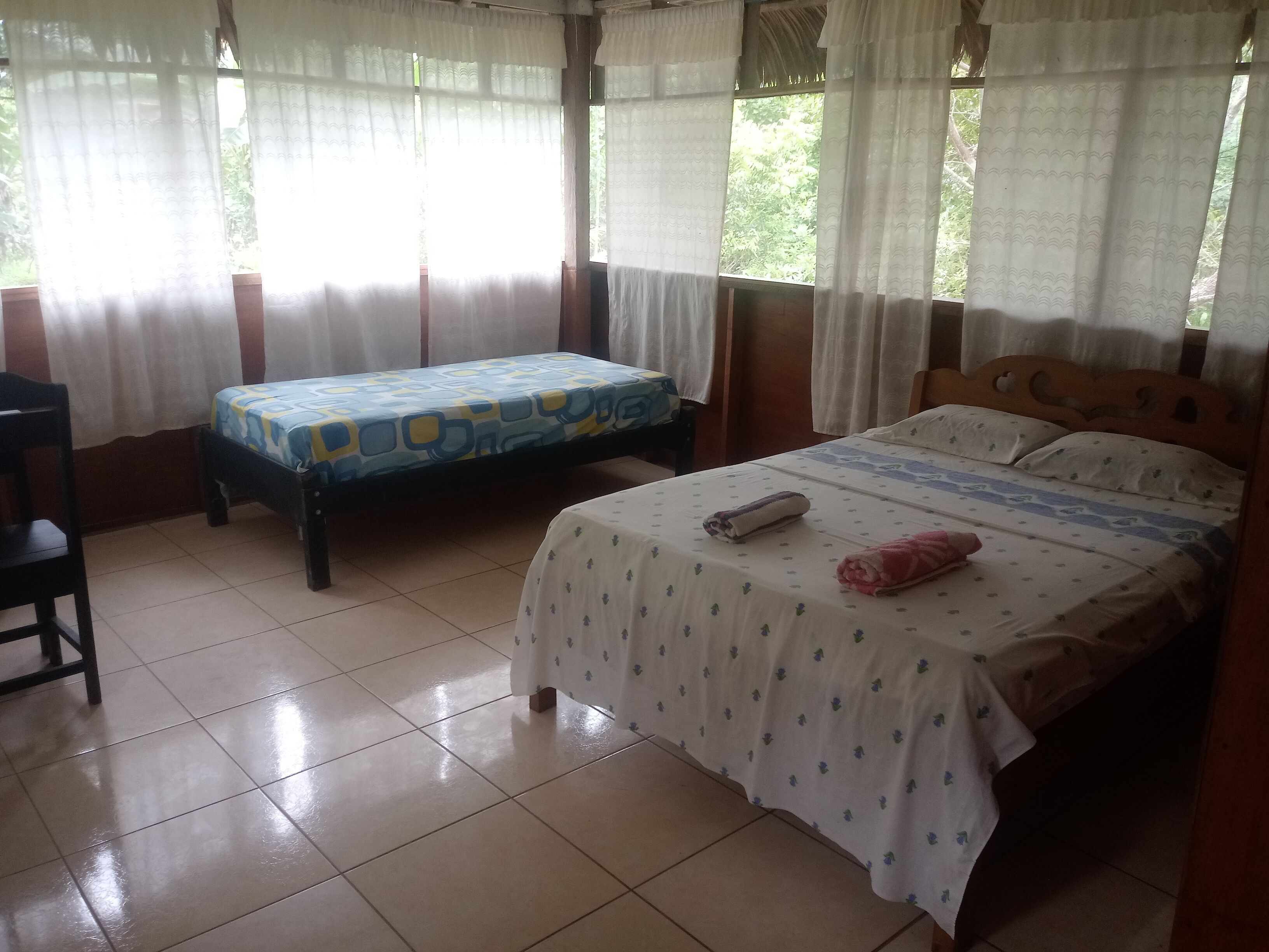 Desk, blackout curtains, bed sheets