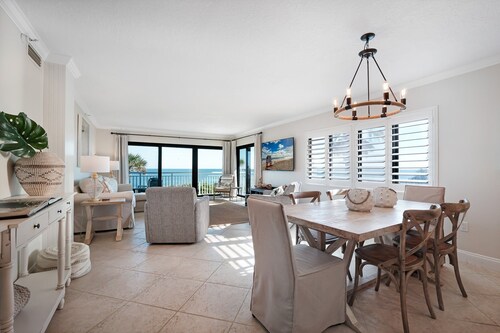 Direct oceanfront 2/2 corner condo with large wrap-around balcony and heated pool