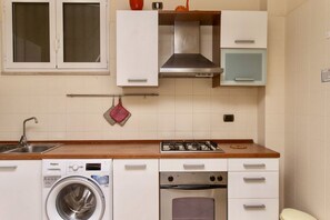 Fridge, oven, dining tables