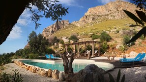 Outdoor pool, open 9:00 AM to 8:00 PM, pool loungers