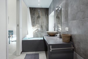 Superior Suite, 1 Queen Bed, Garden View | Bathroom | Combined shower/tub, deep soaking tub, designer toiletries, hair dryer