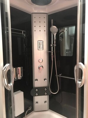 Bathtub, hair dryer, towels