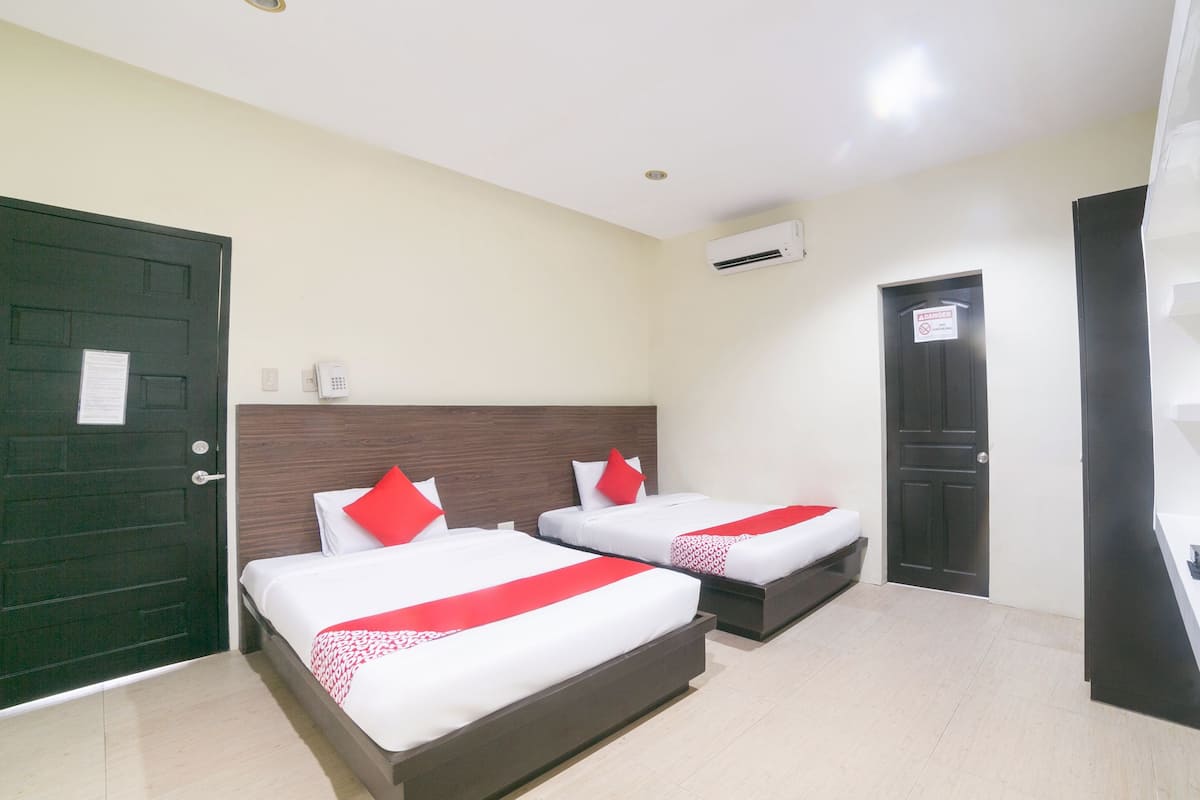 Habitación Deluxe con 2 camas individuales | 1 habitación, wifi gratis y ropa de cama