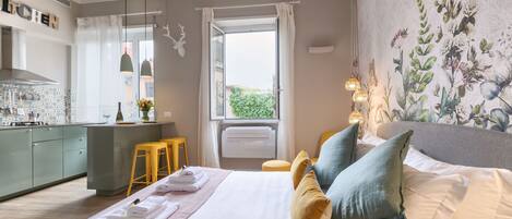 Tabla de planchar con plancha, cunas, wifi gratis y ropa de cama