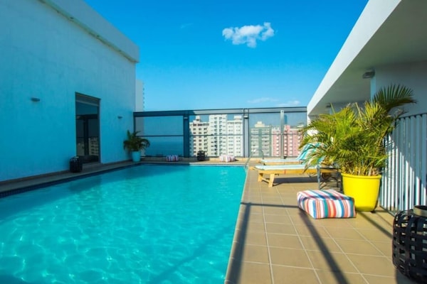 Outdoor pool, open 7:00 AM to 9:00 PM, pool umbrellas, sun loungers