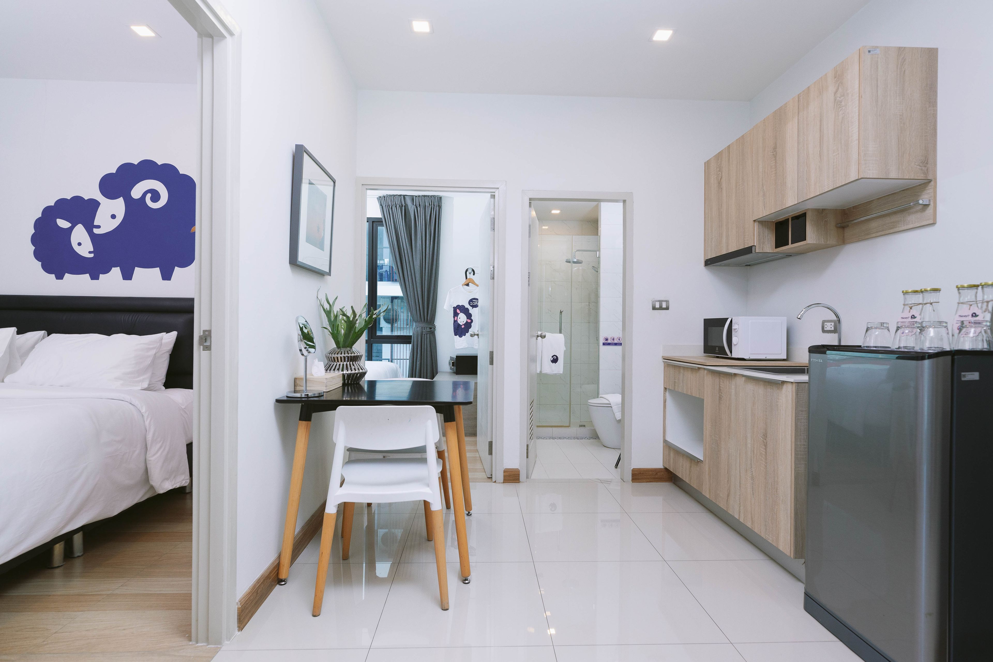 2 bedrooms family suite (king + twin) | private kitchenette | full-sized fridge, electric kettle