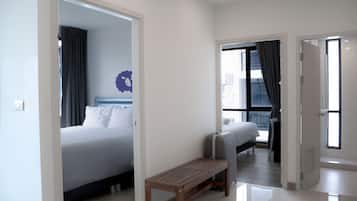 2 Bedrooms Family Suite (King + Twin) | Desk, blackout drapes, free WiFi, bed sheets