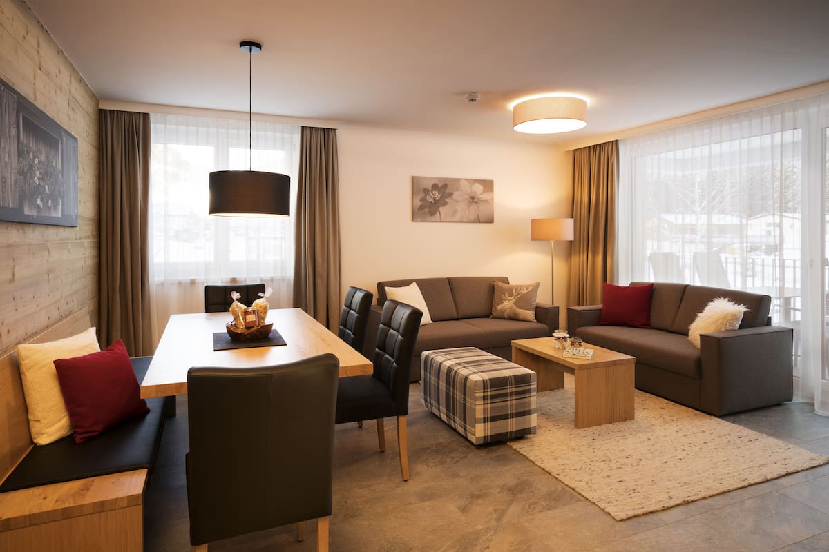 Departamento Premium (Murmeltier) | Área de sala de estar | Smart TV de 55 pulgadas con canales por cable y televisión