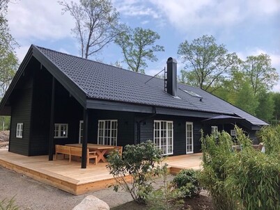 Stylish Lake house, outdoor hottub Lake view Close to nature. Pet friendly.