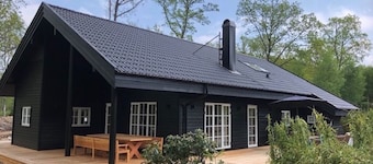 Stylish Lake house, outdoor hottub Lake view Close to nature. Pet friendly.