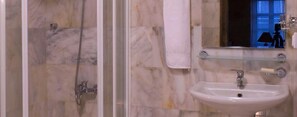 Shower, free toiletries, hair dryer, slippers