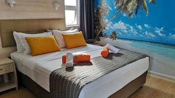 Deluxe Double Room, Sea View | Hypo-allergenic bedding, minibar, in-room safe, individually furnished