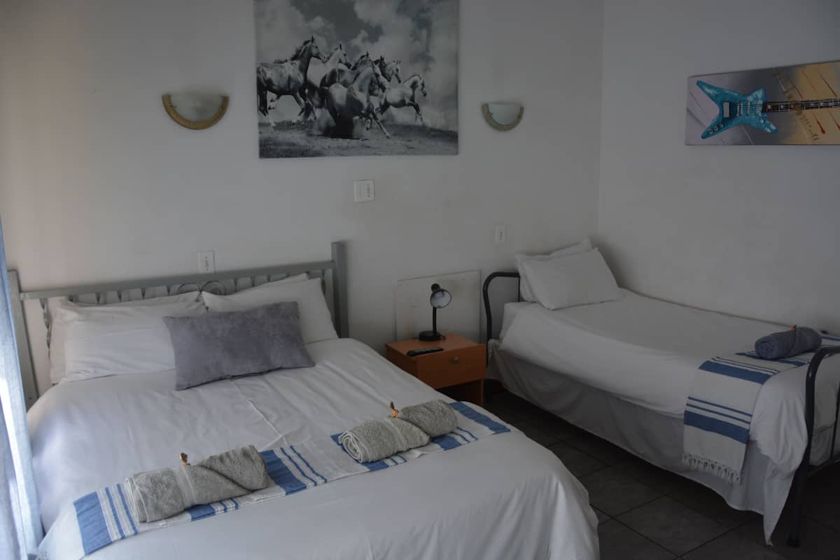 Comfort Triple Room (Private bathroom across the hall) | Premium bedding, in-room safe, desk, laptop workspace
