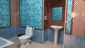 Shower, free toiletries, hair dryer, towels