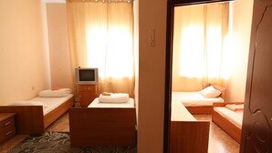 이코노미 쿼드룸 | 암막 커튼, 다리미/다리미판, 간이 침대, 무료 WiFi