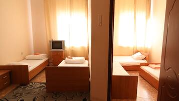 Economy Quadruple Room | Blackout drapes, iron/ironing board, rollaway beds, free WiFi