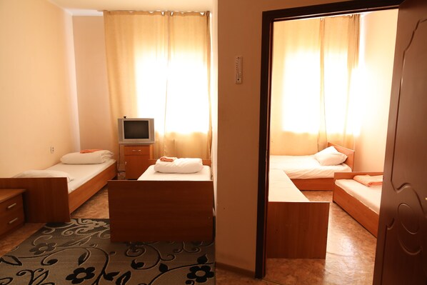 Economy Quadruple Room | Blackout drapes, iron/ironing board, rollaway beds, free WiFi