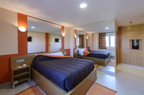Desk, blackout curtains, soundproofing, free cots/infant beds