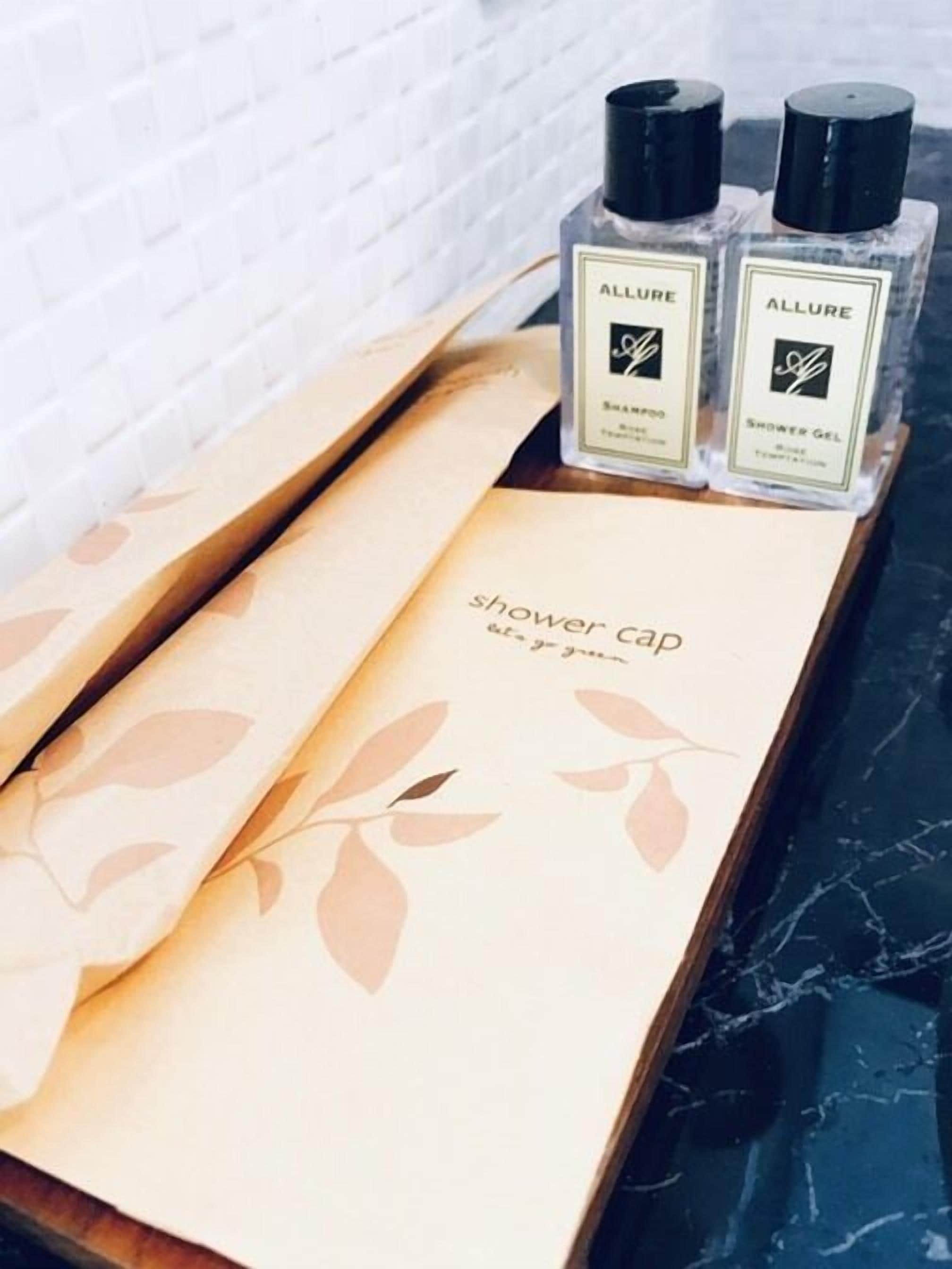 shower, free toiletries, bathrobes, slippers