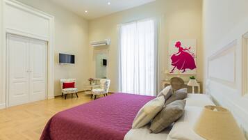 Luxury Triple Room (Suite La Gatta Cenerentola) | Individually decorated, individually furnished, desk, laptop workspace