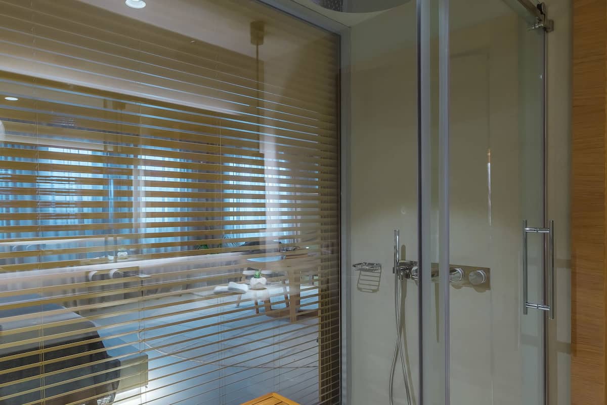 premium room, 1 double bed | bathroom | shower, free toiletries, hair dryer, bathrobes