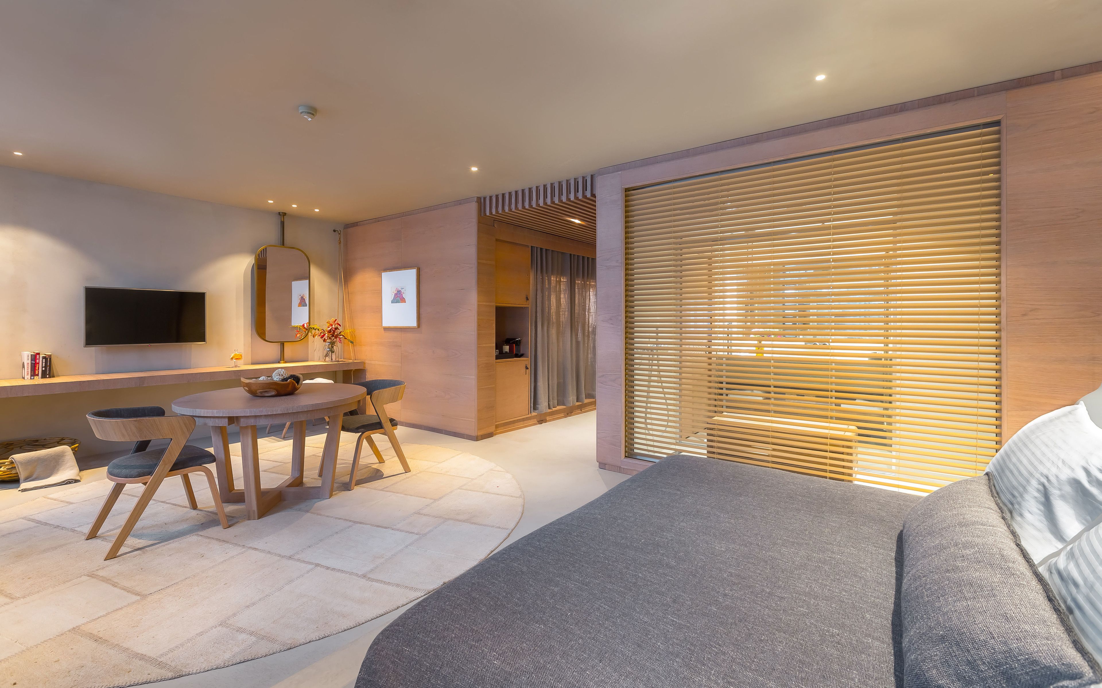 junior suite | in-room safe, desk, blackout curtains, soundproofing