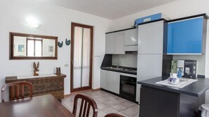 Apartment, 2 Bedrooms | Private kitchen - Villetta Azzurra Suaredda (San Teodoro)