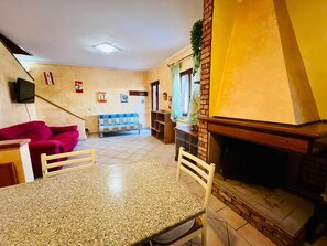 Apartment, 2 Bedrooms | Living area - Badualga Pink (San Teodoro)