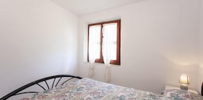Apartment, 2 Bedrooms | 2 bedrooms, bed sheets - Appartamento Launeddas (Posada)