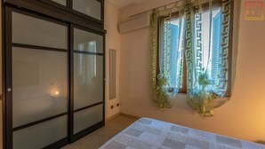 Apartment, 2 Bedrooms | 2 bedrooms, bed sheets
