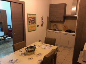 Apartment, 2 Bedrooms | Private kitchen | Full-size fridge, oven, stovetop, cookware/dishes/utensils - Rockefeller Suite (Alghero)