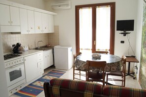 Appartamento, 1 camera da letto | Cucina privata | Frigorifero con congelatore, forno, piano cottura