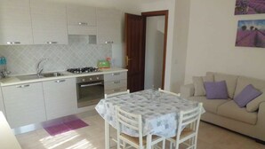 Villa, 4 Bedrooms | Living area | LCD TV - Le Ville Di Lutturai (San Teodoro)