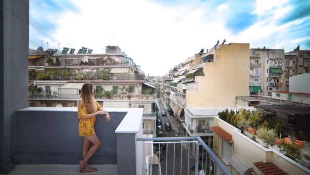 A balcony with a view of a cityscape. - Athens Morum City Apartments (Vyronas)