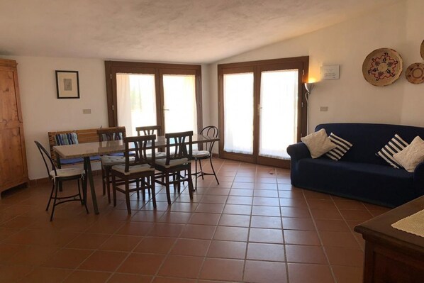 Apartment, 3 Bedrooms | Living area | Flat-screen TV
