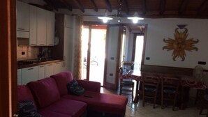 Apartment, 3 Bedrooms | Living room | Flat-screen TV - Delfino House (San Teodoro)