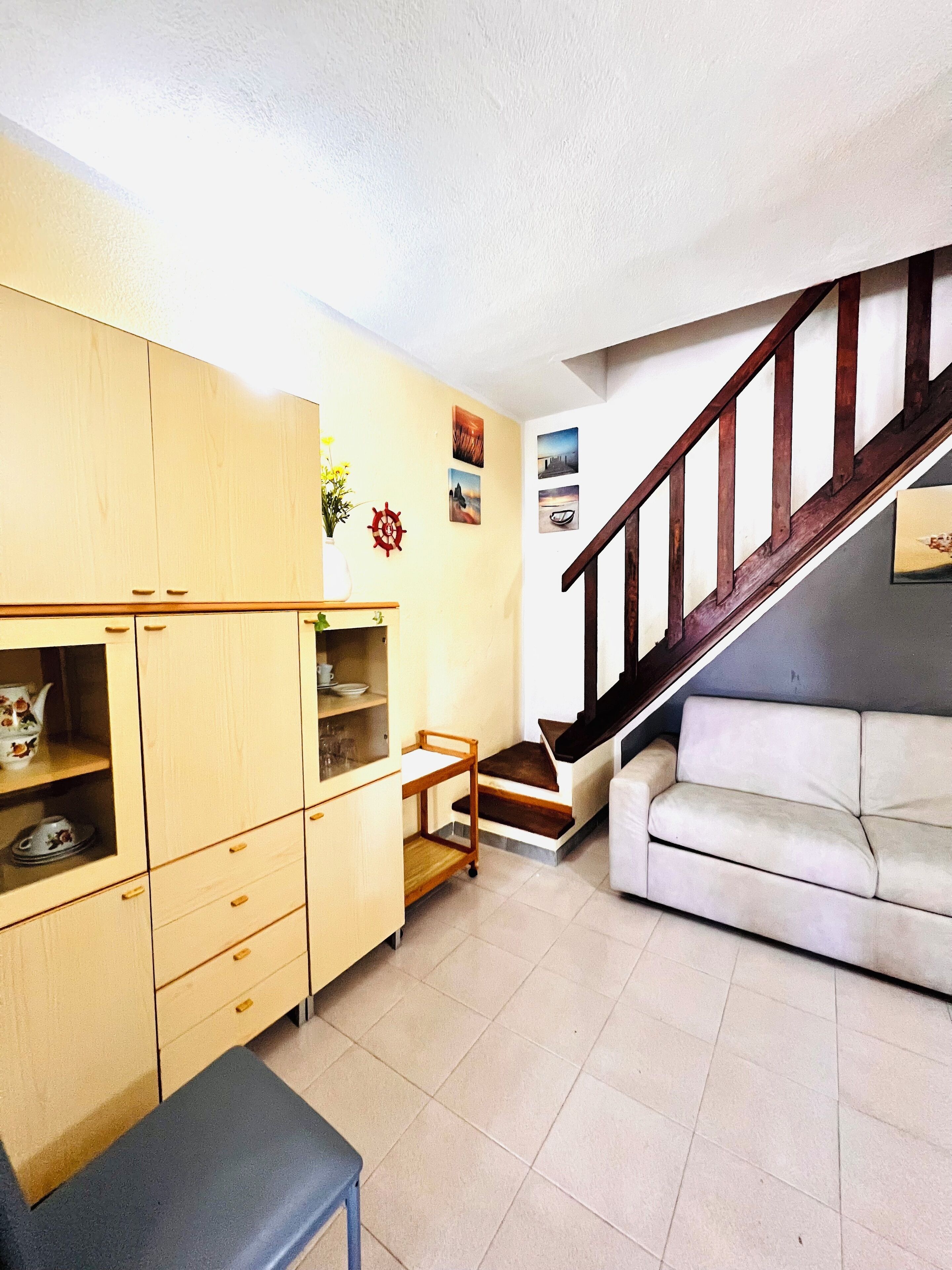 Apartamento, 2 habitaciones | Zona de estar | Una televisión de pantalla plana