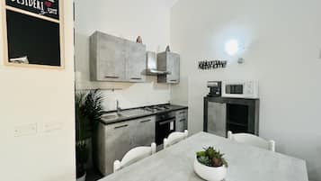 Apartment, 2 Bedrooms | Private kitchen | Full-sized fridge, oven, stovetop, espresso maker