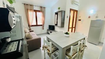 Apartment, 2 Bedrooms | Private kitchen | Full-sized fridge, oven, stovetop, espresso maker
