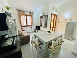Apartment, 2 Bedrooms | Private kitchen | Full-sized fridge, oven, stovetop, espresso maker - Appartamenti San Teodoro IV (San Teodoro)