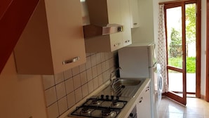 Apartment, 2 Bedrooms | Private kitchen - Fenicottero House (San Teodoro)