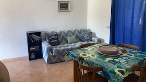 Apartment, 2 Bedrooms | Living area | Flat-screen TV - Goceano House (San Teodoro)